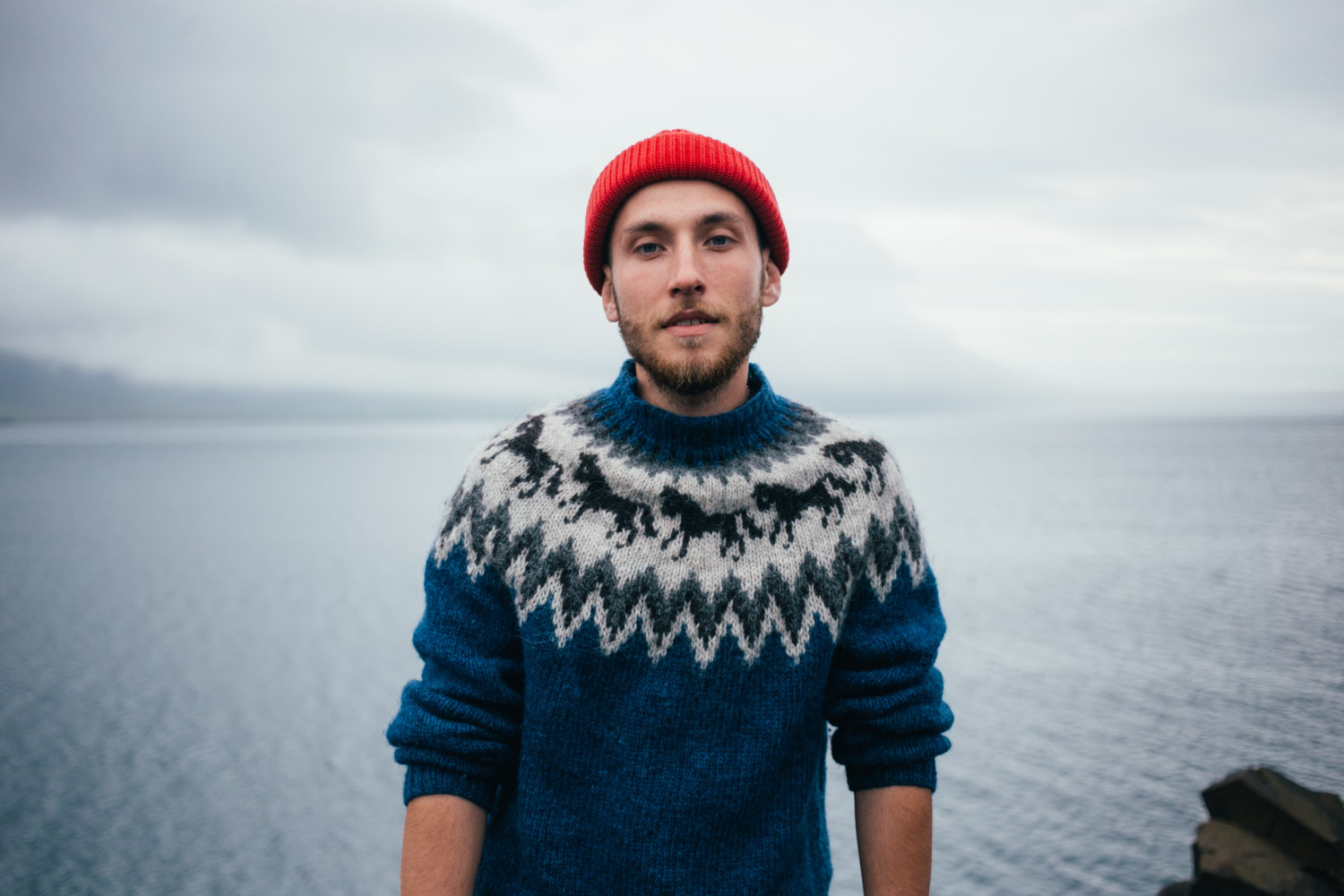 Man wearing a knit sweater | Complete Fire And Security Solutions